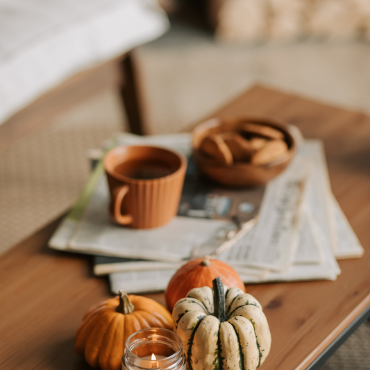 A tranquil sanctuary of flickering candlelight, where scent and craftsmanship weave an enchanting atmosphere.